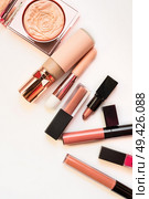 Set of luxury beautiful cosmetics for fashion make up  on white  background. Стоковое фото, агентство Ingram Publishing / Фотобанк Лори