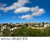 Campello skyline in Alicante view from beach Morro blanc in Spain. Стоковое фото, агентство Ingram Publishing / Фотобанк Лори