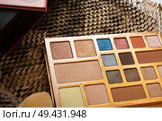fashion set of new cosmetics palettes. unpacking. Стоковое фото, агентство Ingram Publishing / Фотобанк Лори