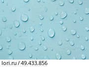 Капли воды на гладкой голубой поверхности. Стоковое AI-изображение, AI-художник Александр Жуков / Фотобанк Лори