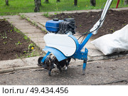 A tillerblock for tillage. The cultivator is portable and does not use gasoline. Стоковое фото, фотограф Александр Поташев / Фотобанк Лори