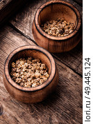 Chard seeds on a wooden table.Seed preparation for sowing. Chard seeds in bowl. Стоковое фото, агентство Ingram Publishing / Фотобанк Лори