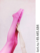Female legs wearing pink tights                                . Стоковое фото, агентство Ingram Publishing / Фотобанк Лори