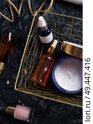 set of nature precious oils and  care cosmetics on black background . Стоковое фото, агентство Ingram Publishing / Фотобанк Лори