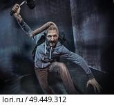 Skinny, geek thief during the robbery. Стоковое фото, агентство Ingram Publishing / Фотобанк Лори