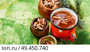Tea with pine buds for treating colds.Pine buds.Herbal medicine. Tea with pine buds. Стоковое фото, агентство Ingram Publishing / Фотобанк Лори