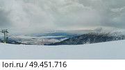 Bansko resort panoramic view with ski slope, view from the top of the mountain, Bulgaria. Стоковое фото, агентство Ingram Publishing / Фотобанк Лори