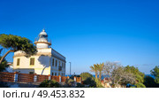 Oropesa de Mar lighthouse Faro in Castellon of Spain. Стоковое фото, агентство Ingram Publishing / Фотобанк Лори