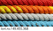 A row of ropes with different colors and textures. Стоковое AI-изображение, AI-художник Ярославский Максим / Фотобанк Лори
