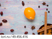 blue wooden background with cinnamon, anise, dog rose  and lemon. Стоковое фото, агентство Ingram Publishing / Фотобанк Лори