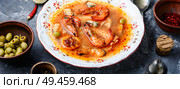 Traditional thai cuisine.Tom yum goong.Spicy shrimp soup. Spicy soup with seafood. Стоковое фото, агентство Ingram Publishing / Фотобанк Лори