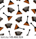 Russian musical instrument seamless pattern made of balalaika and accordion. Folklore sound making items, icons set isolated on vector Illustration. Russian Musical Instruments Vector IIlustration. Стоковая иллюстрация, агентство Ingram Publishing / Фотобанк Лори