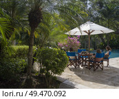Tourists at resort, Chaa Creek Road, Chaa Creek Nature Reserve, San Ignacio, Belize. Стоковое фото, агентство Ingram Publishing / Фотобанк Лори