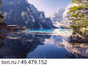 Summer morning at Lago di Braies (also known as Pragser Wildsee) in Dolomites Mountains, Sudtirol, Italy.. Summer morning at Lago di Braies, Italy. Стоковое фото, агентство Ingram Publishing / Фотобанк Лори