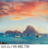 Ibiza cala d Hort with Es Vedra islet sunset in Sant Josep of Balearic Islands. Стоковое фото, агентство Ingram Publishing / Фотобанк Лори