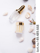 precious skin care cosmetics around  natural shells and gemstones. close up. Стоковое фото, агентство Ingram Publishing / Фотобанк Лори