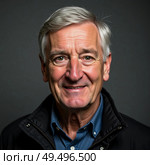 A cheerful elder man exudes warmth and approachability, with gray hair framing his face and a friendly smile that invites conversation. He wears a dark jacket and a light shirt Generative AI. Стоковое AI-изображение, AI-художник Юлия Петровская / Фотобанк Лори