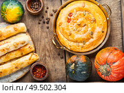 Moldovan pie made of yeast puff pastry.Pie with pumpkin.Placinta. Traditional Moldavian pie. Стоковое фото, агентство Ingram Publishing / Фотобанк Лори