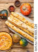 Moldovan pie made of yeast puff pastry.Pie with pumpkin.Placinta. Moldavian pumpkin pie. Стоковое фото, агентство Ingram Publishing / Фотобанк Лори