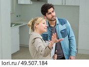couple looking satisfied in ther new appart. Стоковое фото, агентство Ingram Publishing / Фотобанк Лори
