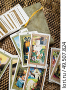divination card Tarot with pouch. close up. Редакционное фото, агентство Ingram Publishing / Фотобанк Лори