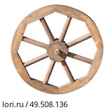 Старое деревянное колесо от телеги на белом фоне. Wooden cartwheel isolated on white background. Стоковое фото, фотограф Татьяна Д / Фотобанк Лори