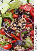 vegetarian fresh salad with vegetables, herbs and  sprouts  of buckwheat.  healthy raw eating food. macro shor. Стоковое фото, агентство Ingram Publishing / Фотобанк Лори