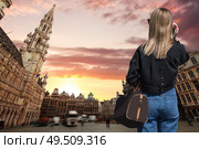 Woman walks in the evening in the center of Brussels. Стоковое фото, агентство Ingram Publishing / Фотобанк Лори