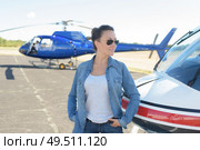 woman on helicopter background. Стоковое фото, агентство Ingram Publishing / Фотобанк Лори
