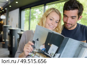 shopping for a new fireplace. Стоковое фото, агентство Ingram Publishing / Фотобанк Лори