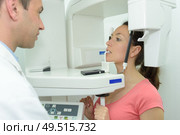 dentist taking patients teeth radiography. Стоковое фото, агентство Ingram Publishing / Фотобанк Лори