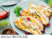 Fish roll.Fish stuffed with vegetables.Banquet dish or Christmas food. Pieces of fish roll. Стоковое фото, агентство Ingram Publishing / Фотобанк Лори