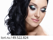 Young beautiful girl with makeup on white background. Стоковое фото, агентство Ingram Publishing / Фотобанк Лори