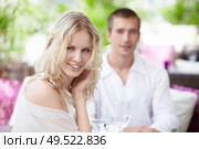 Young happy couple in a white restaurant. Стоковое фото, агентство Ingram Publishing / Фотобанк Лори