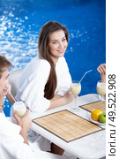 The lovely girl in cafe at pool. Стоковое фото, агентство Ingram Publishing / Фотобанк Лори