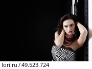 The beautiful young girl on a black background. Стоковое фото, агентство Ingram Publishing / Фотобанк Лори