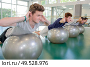 boys working out. Стоковое фото, агентство Ingram Publishing / Фотобанк Лори