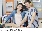 couple stod by a table football game. Стоковое фото, агентство Ingram Publishing / Фотобанк Лори