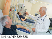 taking blood from the donor. Стоковое фото, агентство Ingram Publishing / Фотобанк Лори