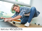 removing the old flooring. Стоковое фото, агентство Ingram Publishing / Фотобанк Лори
