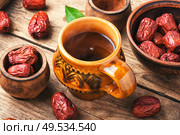Medicinal tea from unabi or jujube.Herbal medicine.Chinese traditional medicine.. Healing tea from ziziphus. Стоковое фото, агентство Ingram Publishing / Фотобанк Лори