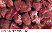Raw sliced pork in sauce. Pieces of fresh marinated pork medallions. Freshly meat tenderloin, perfect for culinary, home cooked meals and flavor. Chopped Pork ham fillet with spice, herbs. 4K video. Стоковое видео, видеограф Марина Демидюк / Фотобанк Лори