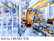 robotic arms in a car plant. robots in a car plant. Стоковое фото, агентство Ingram Publishing / Фотобанк Лори