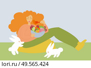 Illustration of a girl eating a bowl of fruits and vegetables with rabbits around her - Veganism - Save the animals. Стоковое фото, агентство Ingram Publishing / Фотобанк Лори