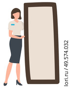 Woman wearing formal uniform standing by big mirror vector, isolated female character working in shop. Store to buy clothes changing room flat style. Fashion Advisor Standing by Mirror Shopping Store. Стоковая иллюстрация, агентство Ingram Publishing / Фотобанк Лори