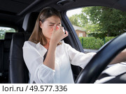 beautiful woman suffering from terrible headache. Стоковое фото, агентство Ingram Publishing / Фотобанк Лори