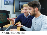 mechanical engineering student studying design from computer. Стоковое фото, агентство Ingram Publishing / Фотобанк Лори