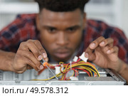 close view of precision work on dismantled computer. Стоковое фото, агентство Ingram Publishing / Фотобанк Лори