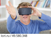 technology gaming entertainment and people concept. Стоковое фото, агентство Ingram Publishing / Фотобанк Лори
