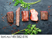 Italian meat platter.Cured meat and sausages.Smoked meat. Spanish cured meat. Стоковое фото, агентство Ingram Publishing / Фотобанк Лори